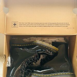 Dr. Martens Shiny Black Boots with Yellow Accents